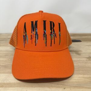 Amiri Paint Drip Logo Orange Trucker Hat